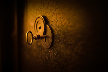 Old key in keyhole. Concept and Idea for History, education, freedom, business, security, secret background.