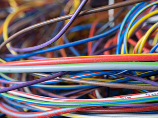 Close-up of confused mixed multi-colored wires