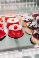 Delicious cakes and desserts in a traditional cafe patisserie.