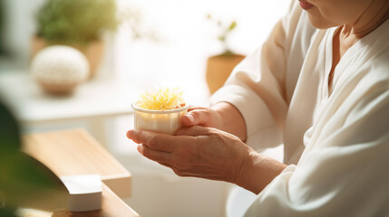 Aromatherapy: A caregiver introduces aromatherapy to an elderly person - obrazy, fototapety, plakaty