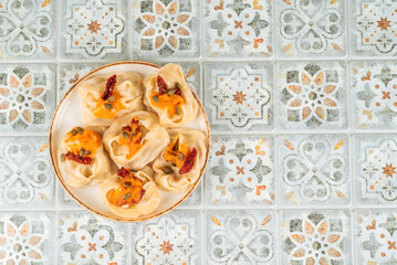 Delicious autumn dumplings with pumpkin and dried tomatoes