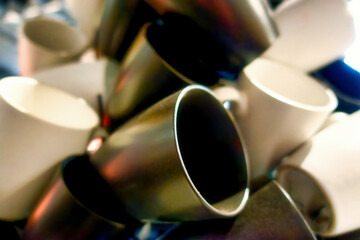 close up image of a set of different colored cups