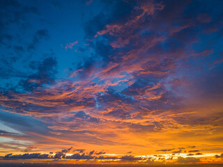 .aerial view amazing colorful cloud in Dramatic Sunset..dramatic sky with colorful orange...