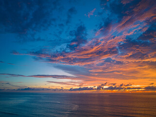 .aerial view amazing colorful cloud in Dramatic Sunset..dramatic sky with colorful orange cloudscape.amazing sky at sunset Gradient color colorful sky in bright sunset background.