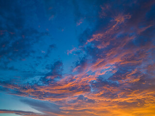 .aerial view amazing colorful cloud in Dramatic Sunset..dramatic sky with colorful orange cloudscape.amazing sky at sunset Gradient color colorful sky in bright sunset background.