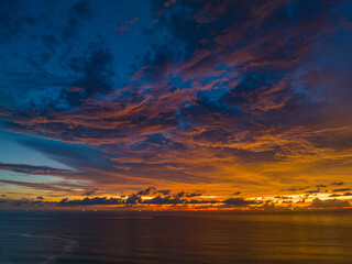 .aerial view amazing colorful cloud in Dramatic Sunset..dramatic sky with colorful orange...