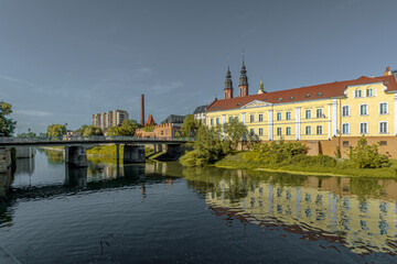 Obraz premium Tenement houses on the Młynowka canal in Opole, Poland.
