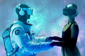 Anonymous male astronaut in spacesuit and woman in casual clothes wearing VR goggles