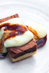 marble sponge cake with creamy custard sauce