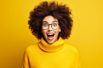 Surprised Young African American Woman with Glasses, Yellow Background, Curly Hair