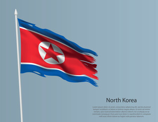 Ragged national flag of North Korea. Wavy torn fabric on blue background