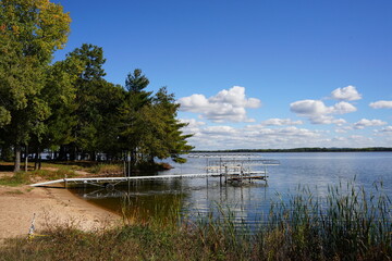 Fall-colored forest during the autumn season landscape out on Castle Rock Lake in Juneau County. 