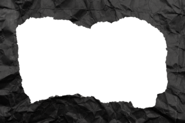 Black paper background with copy space. Hole on a crumpled dark sheet