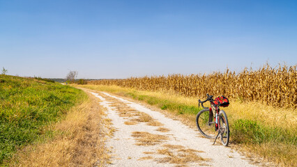 gravel touring bike on Steamboat Trace Trail converted from old railroad running across farmland...