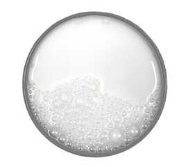 Glass of milk with bubbles isolated on white, top view, clipping path
