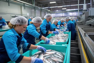 Foto op Plexiglas Women working in a fish processing factory © nordroden