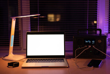 Charging station for laptop and desk lamp when there is no light during blackout. Generator power...