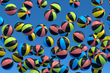 Many of flying beach balls isolated on blue background