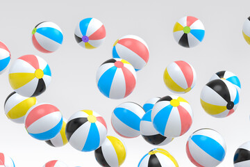 Many of flying beach balls isolated on white background