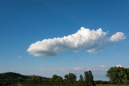 lenticular cloud in a blue sky