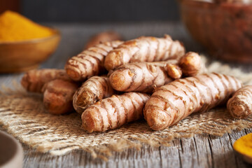 Fresh turmeric root on a table, close up