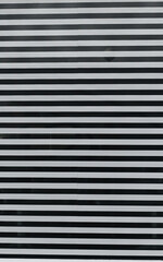 London, UK, 3 September 2023: Background of white wooden slats, texture of wood strips 