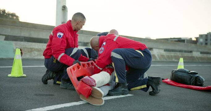 First aid, paramedic gurney and emergency with medical support, accident and injury help. Ambulance, patient and healthcare with CPR, IV drip and wellness check on a street with professional ICU team