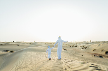 Father and son spending time in the desert