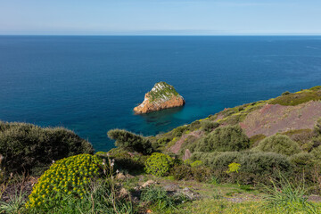 small island just off the coast of Sardinia, Italy