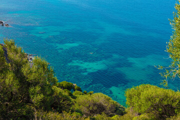 view from the top of the cliff to the beautiful crystal clear sea