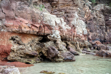 beautiful bay in italy, sardinia, beautiful red rocks
