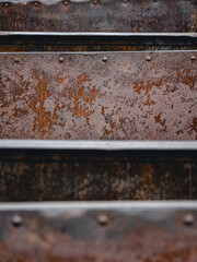 Close-up portrait of aged and weathered Quarry Tubs showcasing rusted imperfection, making it a...