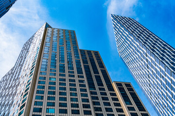 Obraz premium modern building in metropolis city. skyscraper in metropolis city. city downtown with skyscraper. metropolis architecture. skyscraper building architecture. skyscraper with facade. perspective view