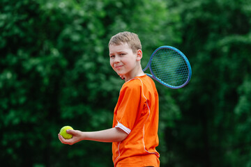 Child with tennis racket on tennis court. Training for young kid, healthy children. Horizontal sport theme poster, greeting cards, headers, website and app