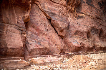 Close-up view of the sandstone rocks during the day in the Siq Gorge, Petra, Jordan