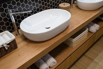 Wash basin in bathroom of modern house