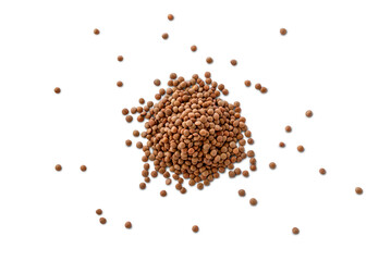 Closeup of a pile of organic uncooked lentils with shadow isolated on a transparent background from above, top view
