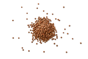 Closeup of a pile of organic uncooked lentils with shadow isolated on a transparent background from above, top view