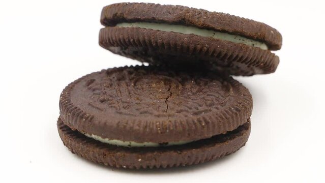 Oreo cookies with cocoa in rotation close-up. Video footage.