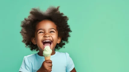 Foto op Aluminium Joyful little girl, with curly hair, eating an ice cream on a pastel green background. Generative AI © Cristina
