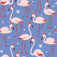 Seamless pattern with flamingos in Santa hats on a background of snowflakes. Winter abstract holiday print with beautiful birds. Vector graphics.
