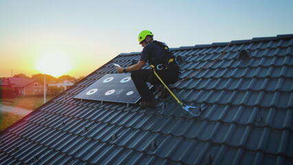 Solar panel engineer installing a photovoltaic cell on a house roof - VFX render