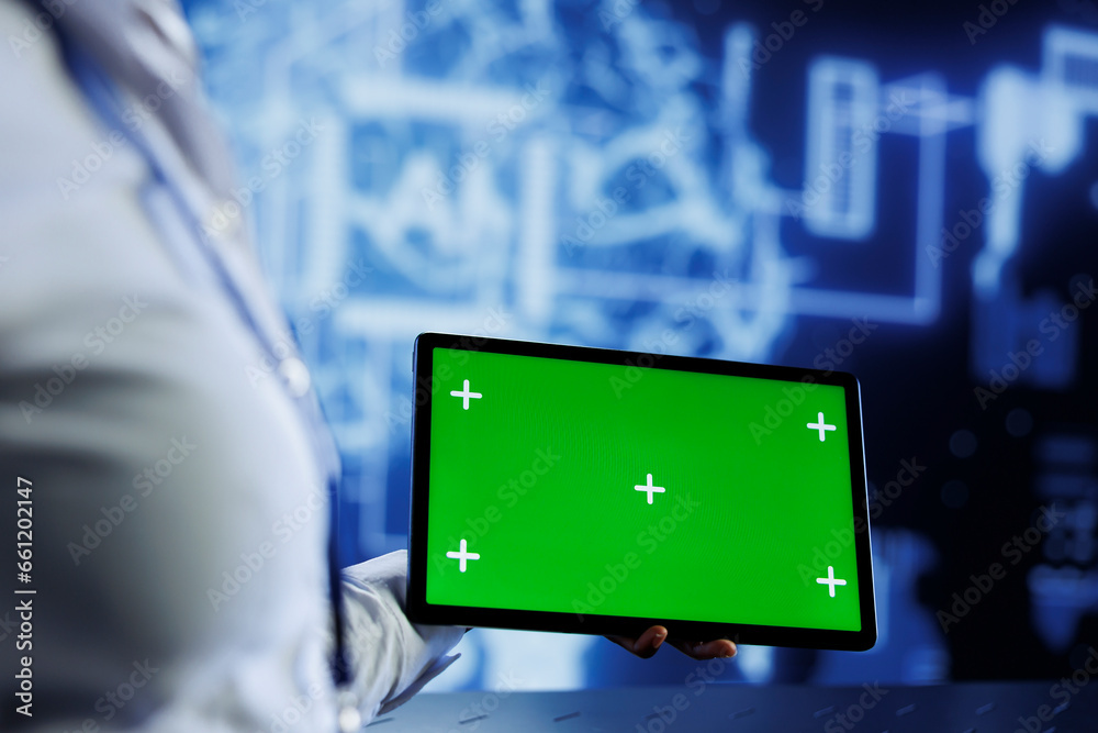 Poster admin uses mockup tablet to develop artificial intelligence neural networks nodes modeled after huma