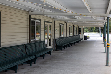  old bus station with green benches