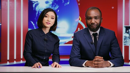 Diverse presenters hosting morning show to cover daily news topics on live tv network, presenting...