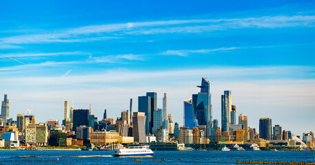 Fototapeta premium skyscraper building of nyc. ny urban city architecture. midtown manhattan and hudson river with boat. metropolitan city. metropolis cityscape. new york downtown. manhattan skyline. new york city