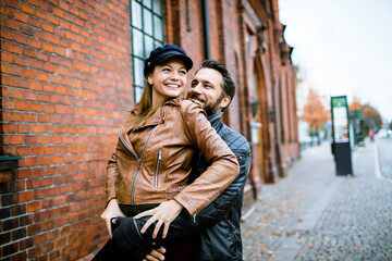 Young loving couple sharing a moment during a walk in the city