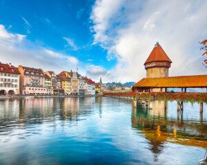 Breathtaking historic city center of Lucerne with famous buildings and old wooden Chapel Bridge (Kapellbrucke)