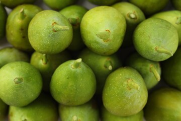 Many fresh green figs as background, top view