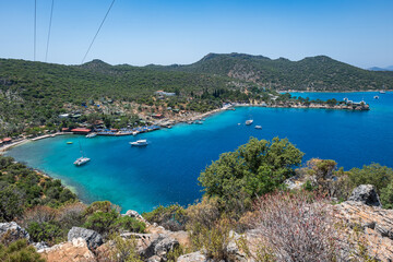 Beautiful coastline landscape of the Mediterranean Sea in Turkey, Kas. Aerial view of turquoise water, mountains and yachts